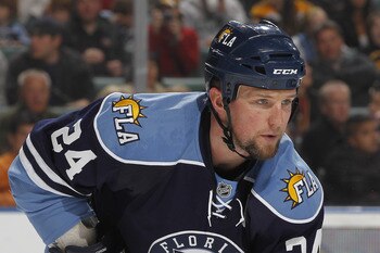 SUNRISE, FL - DECEMBER 27: Bryan McCabe #24 of the Florida Panthers takes his position in the face off circle against the Boston Bruins on December 27, 2010 at the BankAtlantic Center in Sunrise, Florida. The Bruins defeated the Panthers 3-2 in a shoot-ou