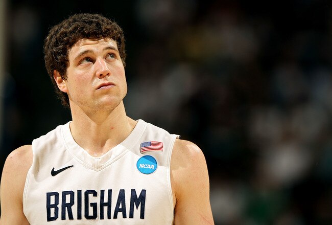 DENVER, CO - MARCH 19:  Jimmer Fredette #32 of the Brigham Young Cougars looks on against the Gonzaga Bulldogs during the third round of the 2011 NCAA men's basketball tournament at Pepsi Center on March 19, 2011 in Denver, Colorado.  (Photo by Doug Pensi