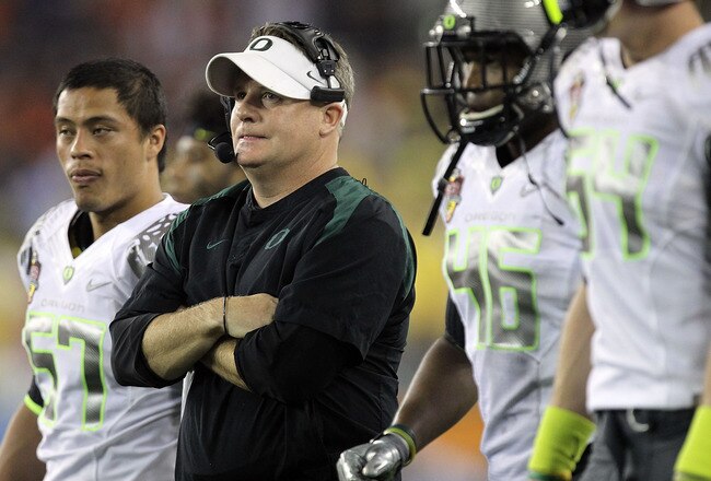 GLENDALE, AZ - JANUARY 10:  Head coach Chip Kelly of the Oregon Ducks looks on against the Auburn Tigers in the Tostitos BCS National Championship Game at University of Phoenix Stadium on January 10, 2011 in Glendale, Arizona.  (Photo by Ronald Martinez/G