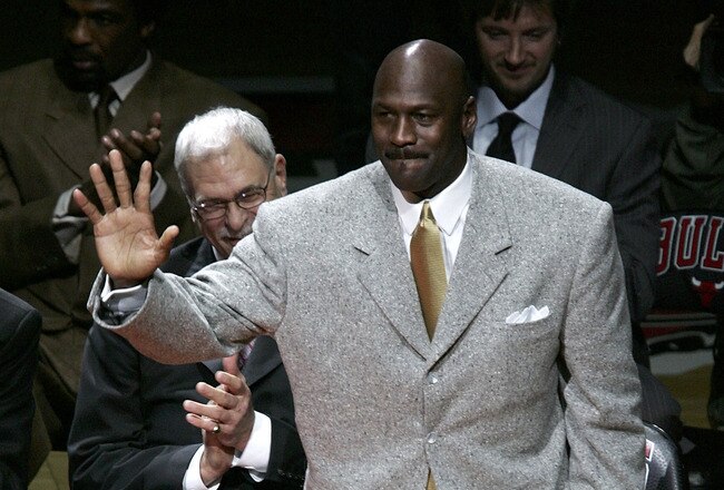 CHICAGO - DECEMBER 9:  Michael Jordan, formerly of the Chicago Bulls, waves to the crowd during a ceremony retiring former teammate Scottie Pippen's #33 at halftime of a game between the Bulls and the Los Angeles Lakers on December 9, 2005 at the United C