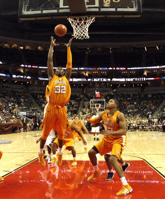 PITTSBURGH, PA - DECEMBER 11:  Scotty Hopson #32 of the Tennessee Volunteers pulls down a rebound against the Pittsburgh Panthers during the SEC/BIG EAST Invitational at Consol Energy Center on December 11, 2010 in Pittsburgh, Pennsylvania.The Volunteers