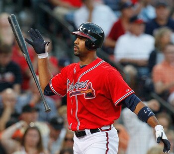 ATLANTA - OCTOBER 10:  Derrek Lee #27 of the Atlanta Braves reacts after striking out against the San Francisco Giants during Game Three of the NLDS of the 2010 MLB Playoffs at Turner Field on October 10, 2010 in Atlanta, Georgia.  (Photo by Kevin C. Cox/