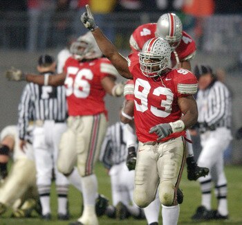 COLUMBUS, OH - NOVEMBER 15:  Defensive end Will Smith #93 of the Ohio State Buckeyes celebrates against the Purdue Boilermakers on November 15, 2003 at Ohio Stadium in Columbus, Ohio. Ohio State defeated Purdue 16-13 in overtime. (Photo by David Maxwell/G