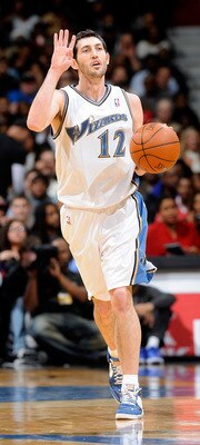 WASHINGTON, DC - DECEMBER 18:  Kirk Hinrich #12 of the Washington Wizards handles the ball against the Miami Heat at the Verizon Center on December 18, 2010 in Washington, DC. NOTE TO USER: User expressly acknowledges and agrees that, by downloading and o