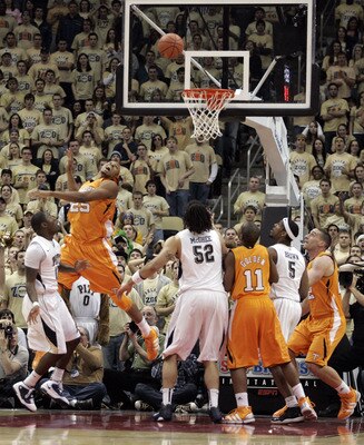PITTSBURGH, PA - DECEMBER 11:  Ashton Gibbs #12 of the Pittsburgh Panthers lays one in against the Tennessee Volunteers during the SEC/BIG EAST Invitational at Consol Energy Center on December 11, 2010 in Pittsburgh, Pennsylvania.  (Photo by Justin K. All