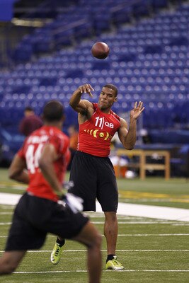 INDIANAPOLIS, IN - FEBRUARY 27:  Cam Newton passes the ball during a drill at the 2011 NFL Scouting Combine at Lucas Oil Stadium on February 27, 2011 in Indianapolis, Indiana. (Photo by Joe Robbins/Getty Images)
