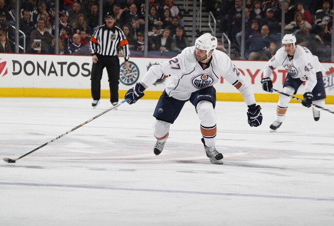 COLUMBUS, OH - FEBRUARY 05: Dustin Penner #27 of the Edmonton Oilers skates with the puck against the Columbus Blue Jackets at Nationwide Arena on February 5, 2011 in Columbus, Ohio.  (Photo by Gregory Shamus/Getty Images)