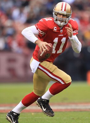 SAN FRANCISCO, CA - JANUARY 02:    Alex Smith #11 of the San Francisco 49ers runs against the Arizona Cardinals during an NFL game at Candlestick Park on January 2, 2011 in San Francisco, California.  (Photo by Jed Jacobsohn/Getty Images)