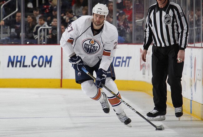 COLUMBUS, OH - FEBRUARY 05: Dustin Penner #27 of the Edmonton Oilers skates with the puck against the Columbus Blue Jackets at Nationwide Arena on February 5, 2011 in Columbus, Ohio.  (Photo by Gregory Shamus/Getty Images)