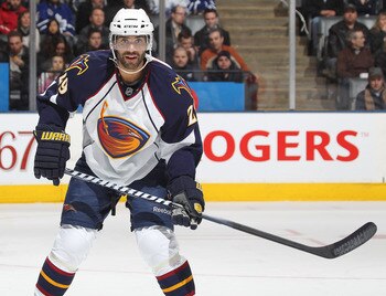 TORONTO, CAN - FEBRUARY 7:  Johnny Oduya #29 of the Atlanta Thrashers defends in a game against the Toronto Maple Leafs on February 7, 2011 at the Air Canada Centre in Toronto, Canada. The Leafs defeated the Thrashers 5-4. (Photo by Claus Andersen/Getty I