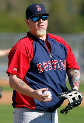 FORT MYERS, FL - FEBRUARY 19:  Pitcher Bobby Jenks #52 of the Boston Red Sox throws during a Spring Training Workout Session at the Red Sox Player Development Complex on February 19, 2011 in Fort Myers, Florida.  (Photo by J. Meric/Getty Images)