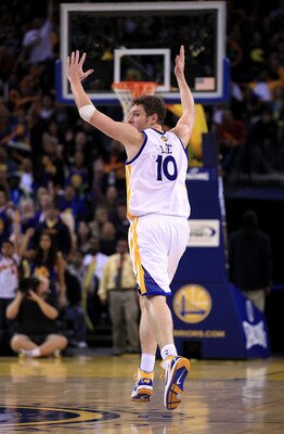 OAKLAND, CA - JANUARY 21:  David Lee #10 of the Golden State Warriors celebrates after the Warriors made a basket during their game against the Sacramento Kings at Oracle Arena on January 21, 2011 in Oakland, California. NOTE TO USER: User expressly ackno