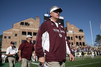 BOULDER, CO - NOVEMBER 07:  Head coach Mike Sherman of the Texas A&M Aggies enters the field for the second half as he leads his team against the Colorado Buffaloes during NCAA college football action at Folsom Field on November 7, 2009 in Boulder, Colora