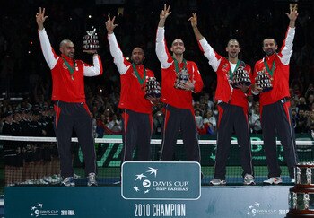 BELGRADE, SERBIA - DECEMBER 05:  (L-R) Nenad Zimonjic, Janko Tipsarevic, Viktor Troicki, Novak Djokovic, Bogdan Obradovic of Serbia celebrate with their trophies after defeating France during day three of the Davis Cup Tennis Final at the Begrade Arena on