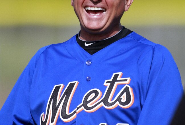 PORT ST. LUCIE, FL - FEBRUARY 17:  Manager Terry Collins #10 of the New York Mets laughs during spring training at Tradition Field on February 17, 2011 in Port St. Lucie, Florida.  (Photo by Marc Serota/Getty Images)