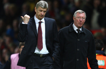MANCHESTER, UNITED KINGDOM - APRIL 29:   Arsenal Manager Arsene Wenger gestures as he walks off with Manchester United Manager Sir Alex Ferguson at the end of the UEFA Champions League Semi Final First Leg match between Manchester United and Arsenal at Ol