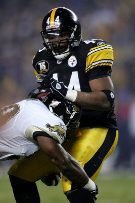 PITTSBURGH - JANUARY 05:  Najeh Davenport #44 of the Pittsburgh Steelers is tackled by Brian Iwuh #59 of the Jacksonville Jaguars in the first quarter of the AFC Wild Card game on January 5, 2008 at Heinz Field in Pittsburgh, Pennsylvania.  (Photo by Chri