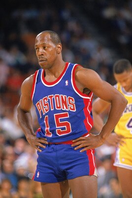 LOS ANGELES - 1989:  Vinnie Johnson #15 of the Detroit Pistons looks on during a game against the Los Angeles Lakers at the Great Western Forum in Los Angeles, California in 1988-1989 NBA season.  (Photo by Mike Powell /Getty Images)