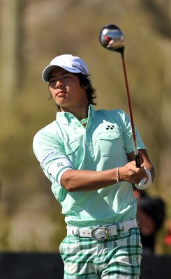 MARANA, AZ - FEBRUARY 23:  Ryo Ishikawa of Japan follows the flight of his tee shot on the 17th hole during the first round match of the Accenture Match Play Championship at the Ritz-Carlton Golf Club at on February 23, 2011 in Marana, Arizona. (Photo by
