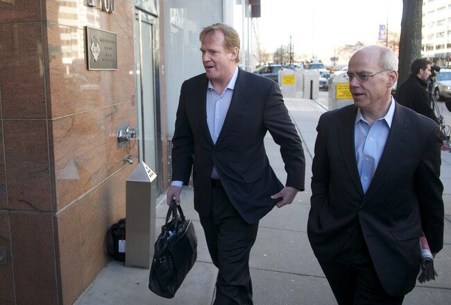 WASHINGTON, DC - MARCH 03:  NFL Commissioner Roger Goodell (L) makes his way into the Federal Mediation and Conciliation Service building for the NFL  labor negotiations on March 3, 2011 in Washington, DC. The NFL owners are locked in negotiations for a n