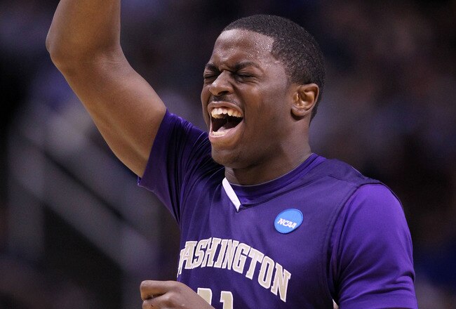 SAN JOSE, CA - MARCH 20:  Forward Matthew Bryan-Amaning #11 of the Washington Huskies celebrates a play against the New Mexico Lobos during the second round of the 2010 NCAA men's basketball tournament at HP Pavilion on March 20, 2010 in San Jose, Califor