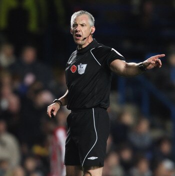 LONDON, ENGLAND - NOVEMBER 14:  Referee Chris Foy signals during the Barclays Premier League match between Chelsea and Sunderland at Stamford Bridge on November 14, 2010 in London, England.  (Photo by Scott Heavey/Getty Images)