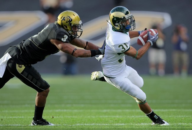 BOULDER, CO - SEPTEMBER 06:  Wide receiver Dion Morton #31 of the Colorado State Ramsmakes a reception as cornerback Jimmy Smith #3 of the Colorado Buffaloes defends at Folsom Field on September 6, 2009 in Boulder, Colorado. The Rams defeated the Buffaloe