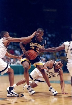 21 Mar 1997:  Forward Johnny Taylor of the Tennessee-Chattanooga Moccasins in action during an NCAA Southeast Regional game against the Providence Friars at the Birmingham-Jefferson Civic Center in Birmingham, Alabama.  Providence won the game 71-65. Mand