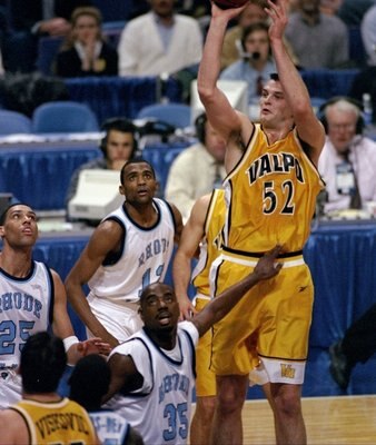 20 Mar 1998:  Center Antanas Vilcinskas of the Valparaiso Crusaders (right) in action against forward Joshua King and center Luther Clay of the Rhode Island Rams during an NCAA tournament game.  Rhode Island defeated Valparaiso 74-68. Mandatory Credit: Ma