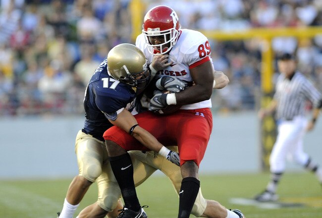 ANNAPOLIS, MD - SEPTEMBER 20: Wide receiver Kevin Brock #89 of the Rutgers Scarlet Knights grabs a pass against the Navy Midshipmen at Jack Stephens Field at Navy-Marine Corps Memorial Stadium on September 20, 2008 in Annapolis, Maryland.  (Photo by Al Me