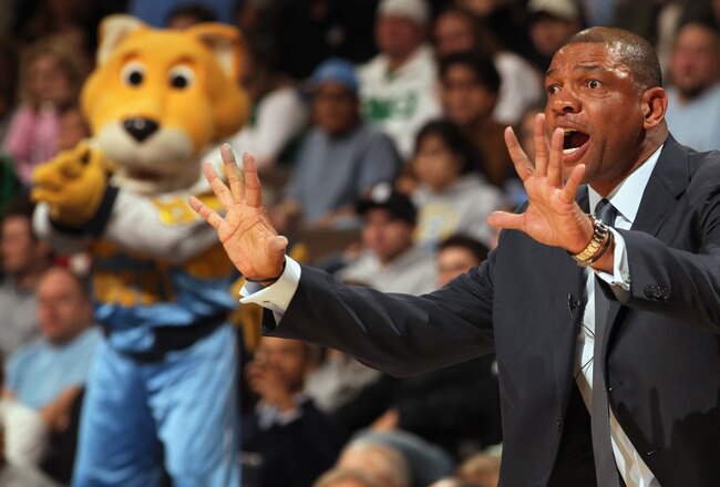 DENVER, CO - FEBRUARY 24:  Head coach Doc Rivers of the Boston Celtics leads his team against the Denver Nuggets during NBA action at the Pepsi Center on February 24, 2011 in Denver, Colorado. The Nuggets defeated the Celtics 89-75. NOTE TO USER: User exp