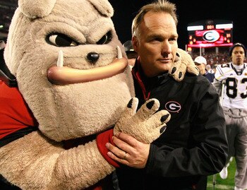ATHENS, GA - NOVEMBER 27:  Head coach Mark Richt and Hairy, mascot of the Georgia Bulldogs, celebrate their 42-34 win over the Georgia Tech Yellow Jackets at Sanford Stadium on November 27, 2010 in Athens, Georgia.  (Photo by Kevin C. Cox/Getty Images)