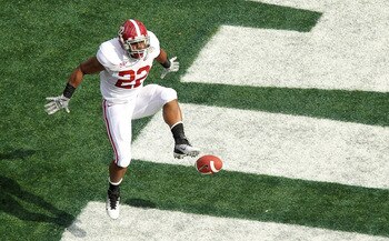 ORLANDO, FL - JANUARY 01: Mark Ingram #22 of the Alabama Crimson Tide scores a touchdown during the Capitol One Bowl against the Michigan State Spartans at the Florida Citrus Bowl on January 1, 2011 in Orlando, Florida.  (Photo by Mike Ehrmann/Getty Image
