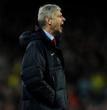 BARCELONA, SPAIN - MARCH 08:  Head coach Arsene Wenger of Arsenal reacts to his players during the UEFA Champions League round of 16 second leg match between Barcelona and Arsenal on March 8, 2011 in Barcelona, Spain.  (Photo by Jasper Juinen/Getty Images