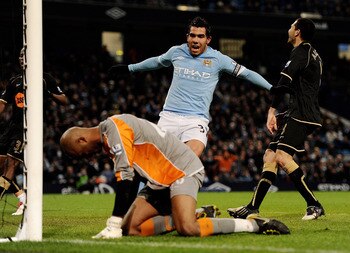 MANCHESTER, UNITED KINGDOM - MARCH 05:   Ali Al Habsi of Wigan Athletic reacts after David Silva of Manchester City scored the first goal during the Barclays Premier League match between Manchester City and Wigan Athletic at the City of Manchester Stadium