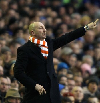 LIVERPOOL, ENGLAND - FEBRUARY 05:  Blackpool manager Ian Holloway shouts instructions to his team during the Barclays Premier League match between Everton and Blackpool at Goodison Park on February 5, 2011 in Liverpool, England.  (Photo by Clive Brunskill