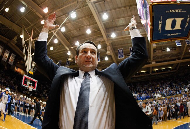 DURHAM, NC - FEBRUARY 09:  Head coach Mike Krzyzewski of the Duke Blue Devils celebrates with fans after defeating the North Carolina Tar Heels 79-73 at Cameron Indoor Stadium on February 9, 2011 in Durham, North Carolina.  (Photo by Streeter Lecka/Getty 