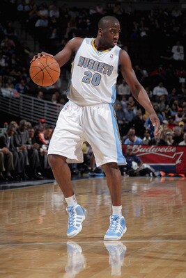 DENVER, CO - MARCH 02:  Raymond Felton #20 of the Denver Nuggets dribbles the ball as he runs the offense against the Charlotte Bobcats at the Pepsi Center on March 2, 2011 in Denver, Colorado. The Nuggets defeated the Bobcats 120-80. NOTE TO USER: User e