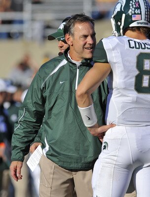IOWA CITY, IA - OCTOBER 30: Michigan State head coach Mark Dantonio talks with quarterback Kirk Cousins #8 on the sidelines during the first half of play against the University of Iowa Hawkeyes at Kinnick Stadium on October 30, 2010 in Iowa City, Iowa. Io