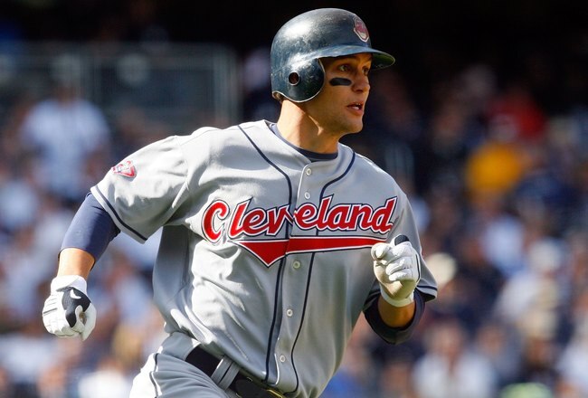 NEW YORK - APRIL 16:  Grady Sizemore #24 of the Cleveland Indians hits a grand slam during the seventh inning on opening day against the New York Yankees at the new Yankee Stadium on April 16, 2009 in the Bronx borough of New York City. This is the first