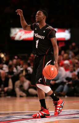 NEW YORK, NY - MARCH 10:  Cashmere Wright #1 of the Cincinnati Bearcats brings the ball up court against the Notre Dame Fighting Irish during the quarterfinals of the 2011 Big East Men's Basketball Tournament presented by American Eagle Outfitters  at Mad