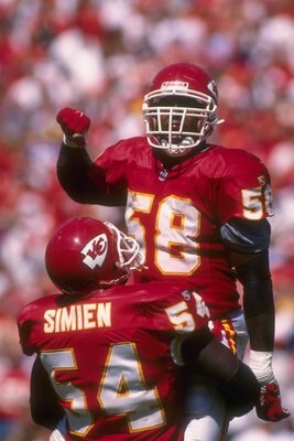 10 Sep 1995: Kansas City Chiefs linebackers Derrick Thomas (right) and Tracy Simien celebrate during a game against the New York Giants at Arrowhead Stadium in Kansas City, Missouri. The Chiefs won the game, 21-17.