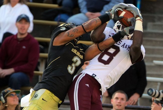 BOULDER, CO - NOVEMBER 07:  Wide receiver Jeff Fuller #8 of the Texas A&M Aggies makes a reception against the defense of Jimmy Smith #3 of the Colorado Buffaloes during NCAA college football action at Folsom Field on November 7, 2009 in Boulder, Colorado