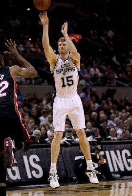 SAN ANTONIO, TX - MARCH 04:  Forward Matt Bonner #15 of the San Antonio Spurs takes a three point shot against the Miami Heat at AT&T Center on March 4, 2011 in San Antonio, Texas.   NOTE TO USER: User expressly acknowledges and agrees that, by downloadin