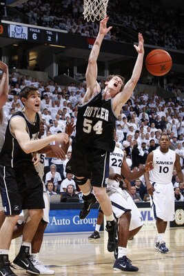 CINCINNATI, OH - DECEMBER 9: Matt Howard #54 of the Butler Bulldogs has the ball knocked away as he goes up for a shot against the Xavier Musketeers at Cintas Center on December 9, 2010 in Cincinnati, Ohio. Xavier defeated Butler 51-49. (Photo by Joe Robb