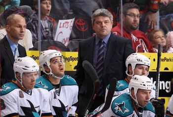 GLENDALE, AZ - JANUARY 17:  Head coach Todd McLellan of the San Jose Sharks watches from the bench during the NHL game against the Phoenix Coyotes at Jobing.com Arena on January 17, 2011 in Glendale, Arizona.  The Sharks defeated the Coyotes 4-2.  (Photo