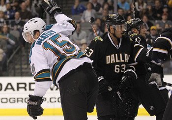 DALLAS, TX - MARCH 15:   Dany Heatley #15 of the San Jose Sharks celebrates a goal against the Dallas Stars at American Airlines Center on March 15, 2011 in Dallas, Texas.  (Photo by Ronald Martinez/Getty Images)