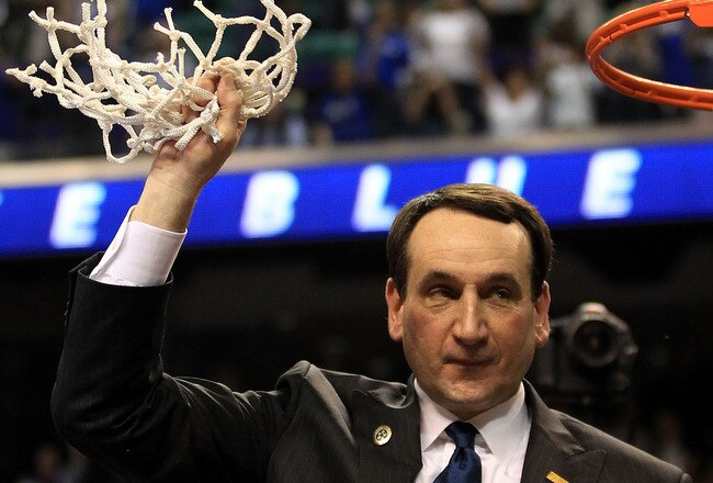 GREENSBORO, NC - MARCH 13:  Head coach Mike Krzyzewski of the Duke Blue Devils cuts down the net after defeating the North Carolina Tar Heels 75-58 in the championship game of the 2011 ACC men's basketball tournament at the Greensboro Coliseum on March 13