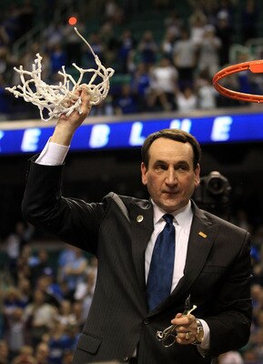 GREENSBORO, NC - MARCH 13:  Head coach Mike Krzyzewski of the Duke Blue Devils cuts down the net after defeating the North Carolina Tar Heels 75-58 in the championship game of the 2011 ACC men's basketball tournament at the Greensboro Coliseum on March 13