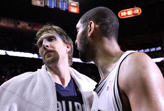SAN ANTONIO - APRIL 29:  Forward Tim Duncan #21 of the San Antonio Spurs greets Dirk Nowitzki #41 of the Dallas Mavericks after a 97-87 win in Game Six of the Western Conference Quarterfinals during the 2010 NBA Playoffs at AT&T Center on April 29, 2010 i